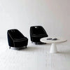 Black and cream Ebony chairs arranged in a formal lounge with a modern white coffee table