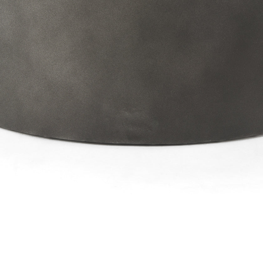 Front view of the Eclipse nesting coffee table set featuring two circular brown wood tops on dark gunmetal gray metal drum bases