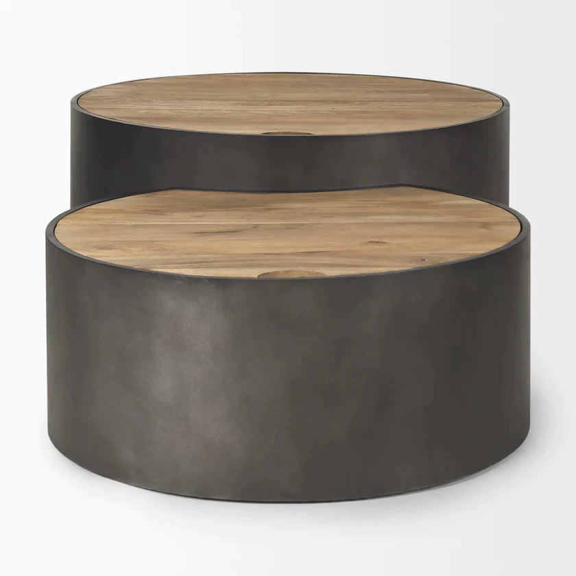 Front view of the Eclipse nesting coffee table set featuring two circular brown wood tops on dark gunmetal gray metal drum bases