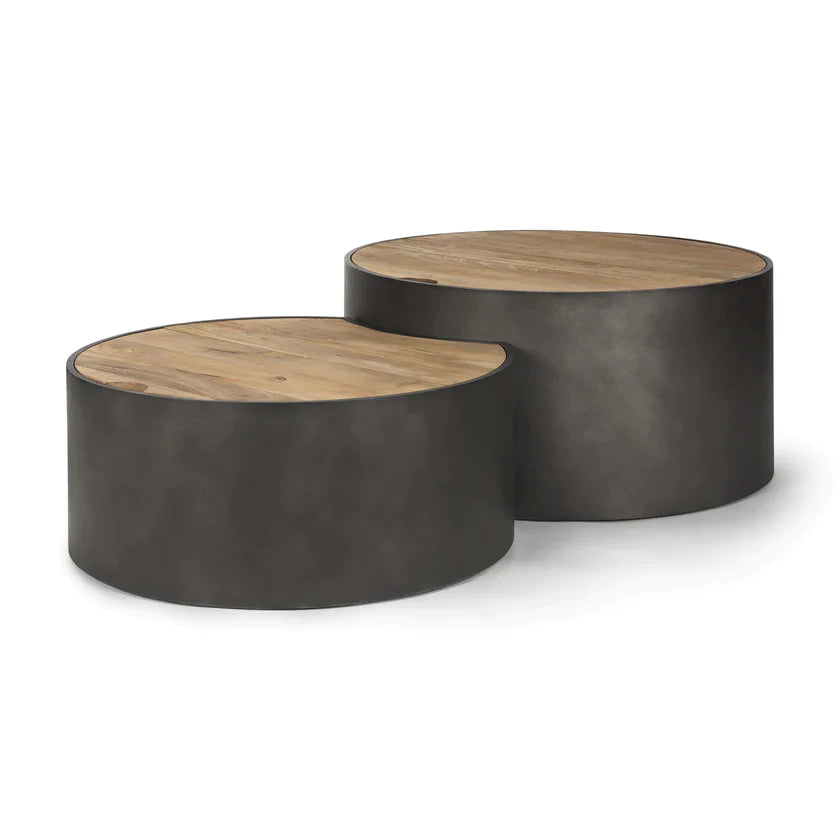 Front view of the Eclipse nesting coffee table set featuring two circular brown wood tops on dark gunmetal gray metal drum bases