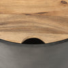 Close-up perspective showing the clean transition between the metal drum base and the inset wooden tabletop