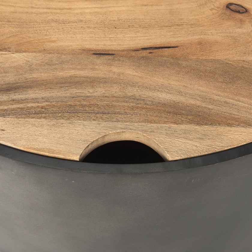 Front view of the Eclipse nesting coffee table set featuring two circular brown wood tops on dark gunmetal gray metal drum bases