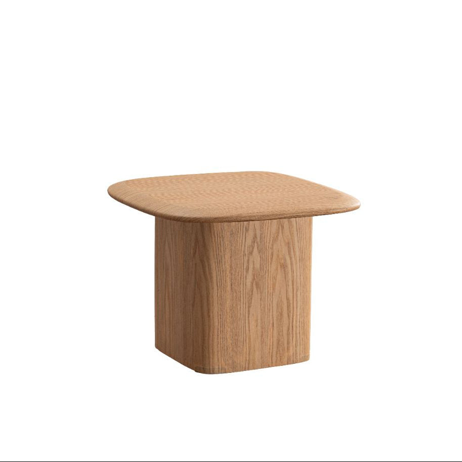 Perspective shot highlighting the clean architectural silhouette and the seamless connection between the table top and base