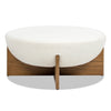 Three-quarter perspective highlighting the plush rounded silhouette and the architectural oak-finish pedestal base