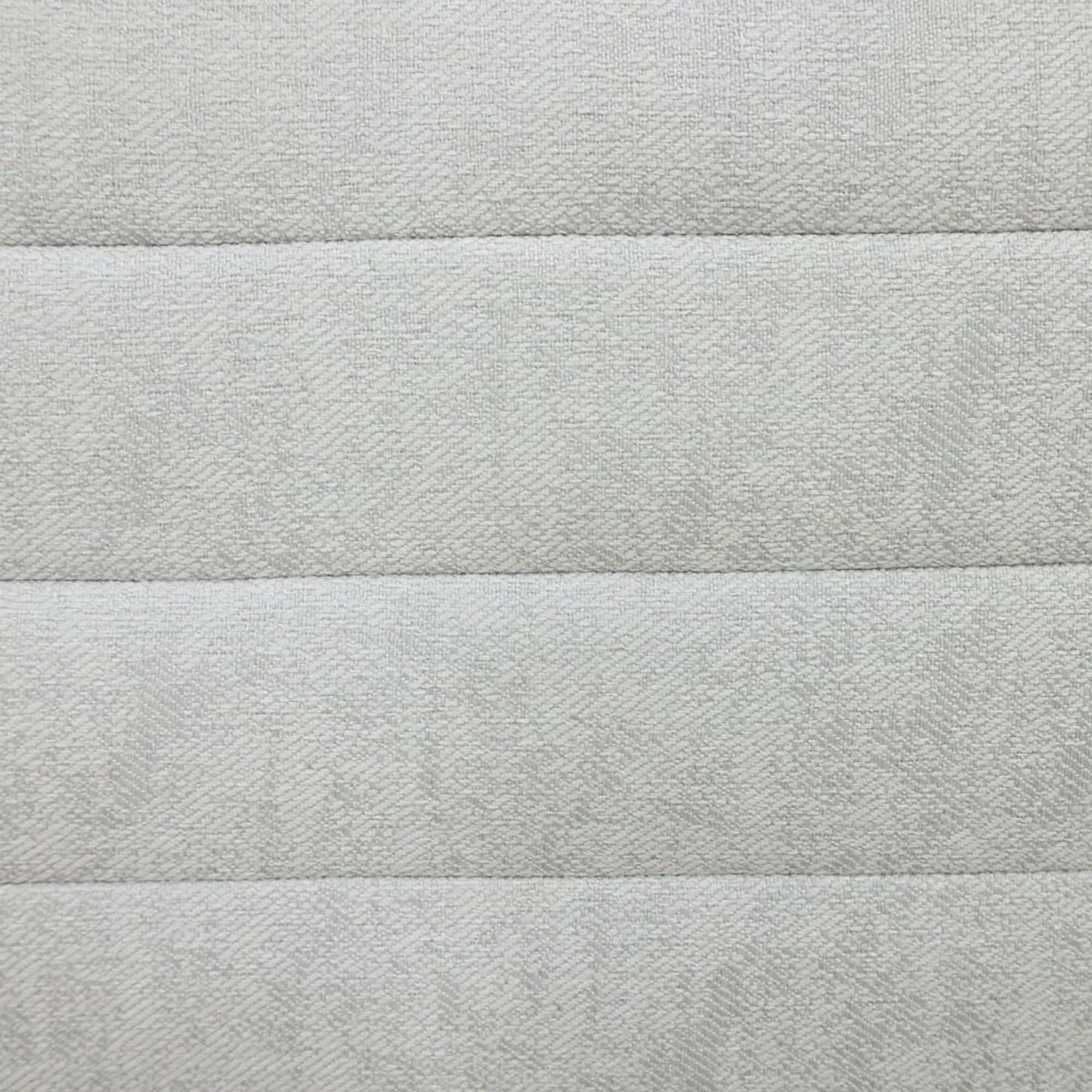 Front view of the Elio oval storage bench featuring platinum gray fabric and modern horizontal channel tufting