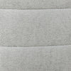 Macro detail shot highlighting the soft woven texture and cool platinum gray tone of the Elio ottoman upholstery