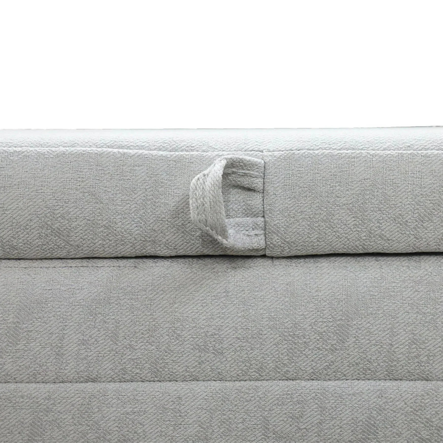 Front view of the Elio oval storage bench featuring platinum gray fabric and modern horizontal channel tufting