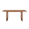 Front view of the Elixir dining table in a light natural oak finish featuring a rectangular tabletop and rounded tapered legs