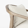 Emil accent chair wood armrest and fabric cushion detail