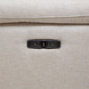 Close-up of the power slide button and USB port on sofa