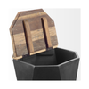 Black geometric storage table with lid propped open