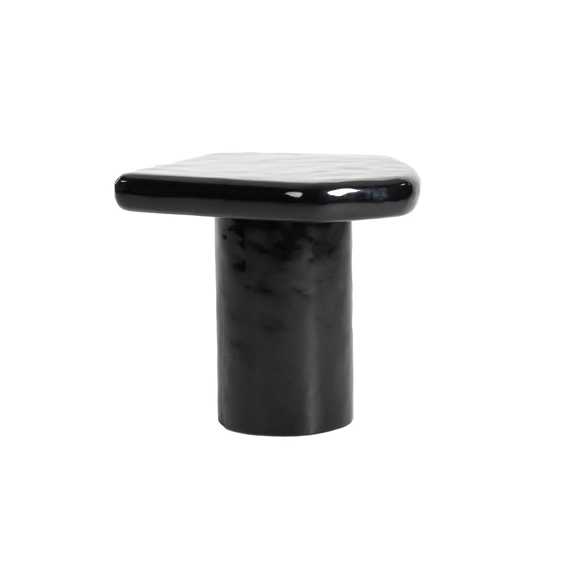 Three-quarter view of the Eternal side table featuring a smooth circular top and a cylindrical pedestal base in a high-gloss black finish