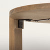 Close-up view of the underside showing the sturdy metal bracket hardware securing the slab legs