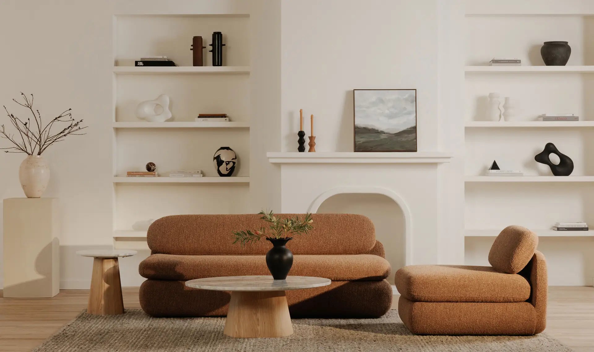 Lifestyle shot featuring the Evelyn table in a bright modern living room with a brown sofa and neutral decor