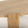 Close-up shot focusing on the smooth surface and organic wood grain patterns of the light brown tabletop