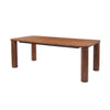 Three-quarter perspective view of the Evolution rectangular dining table in a rich warm wood finish featuring thick cylindrical legs