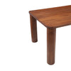 Close-up perspective focusing on the high-quality wood joinery and the robust cylindrical leg design