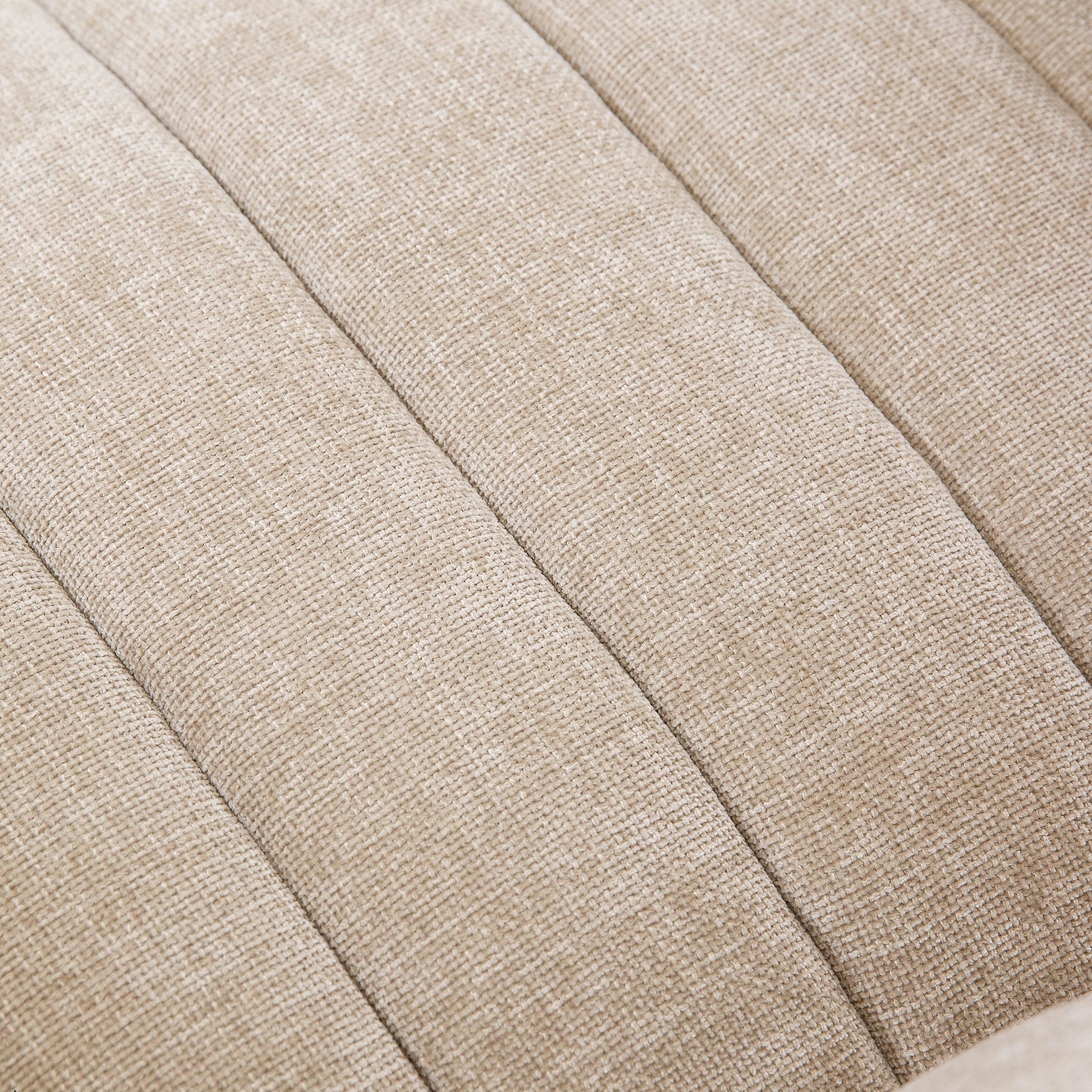 Side profile showcasing the architectural transition from the rounded backrest to the tapered pedestal