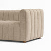 Close-up of Farlov sofa vertical tufted fabric upholstery and armrest detail