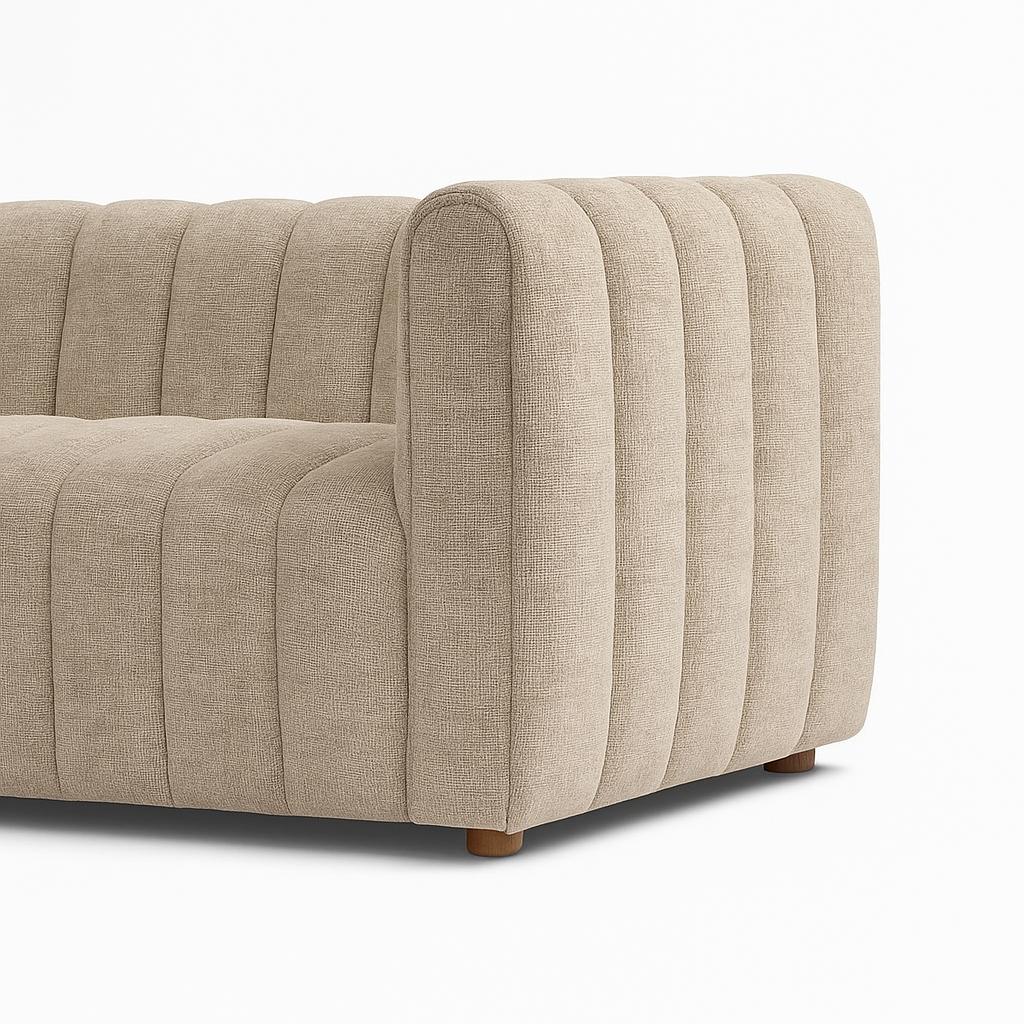 Close-up of Farlov sofa vertical tufted fabric upholstery and armrest detail