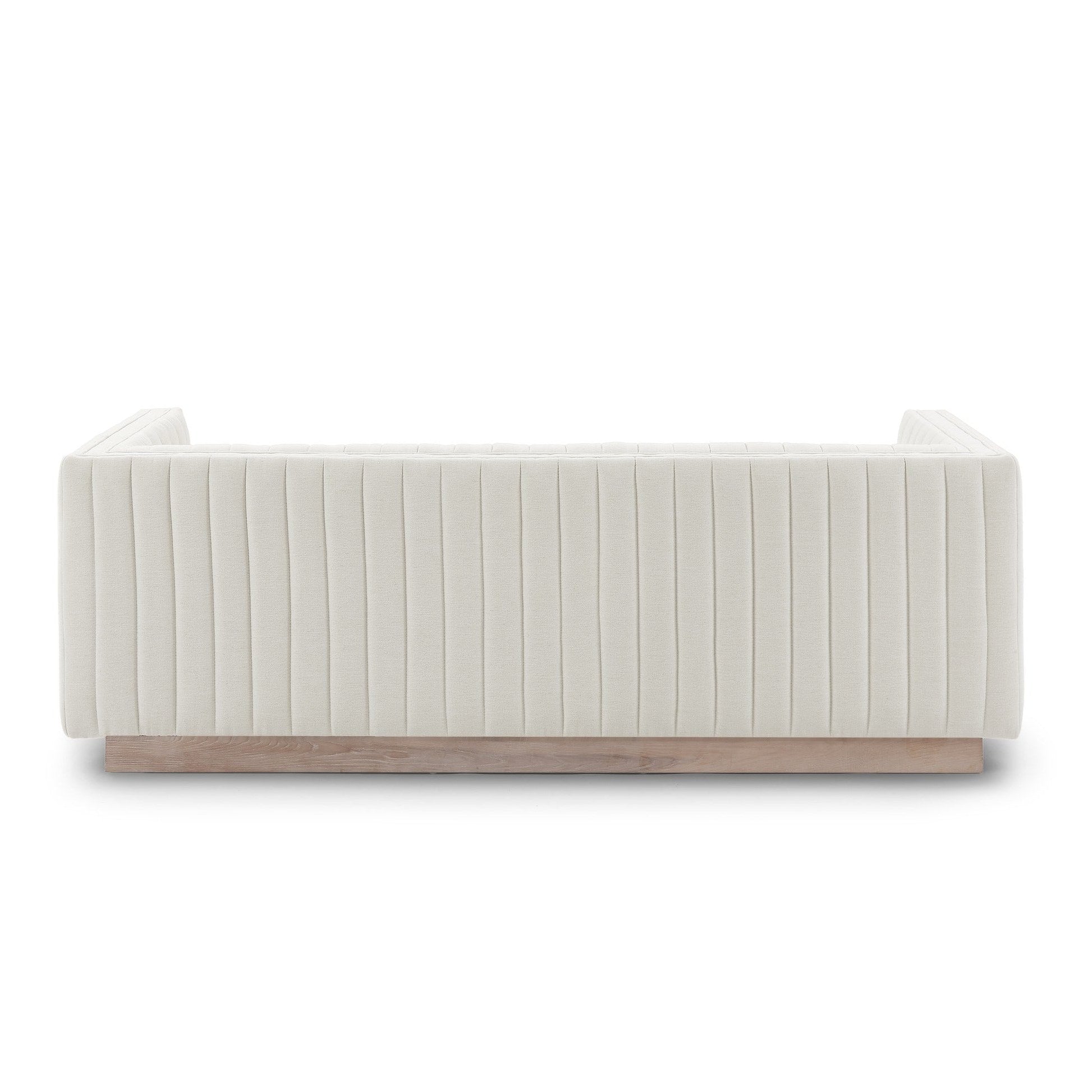 Back view of Fest Mid Century Sofa in Tuscany Cream with vertical channel upholstery and wood base