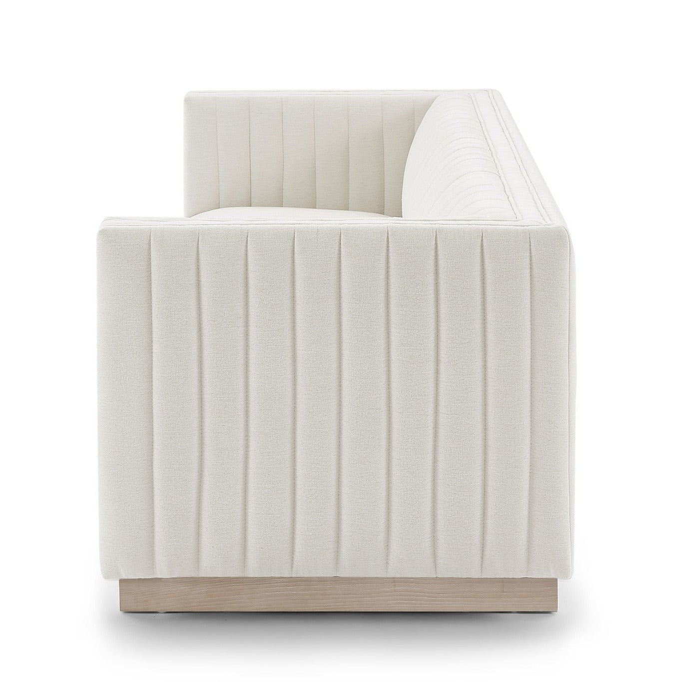 Side profile of Fest Mid Century Sofa in Tuscany Cream fabric with mid century modern silhouette