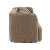 Side view of Fika Premium Boucle Fabric Sofa in brown, soft curved silhouette