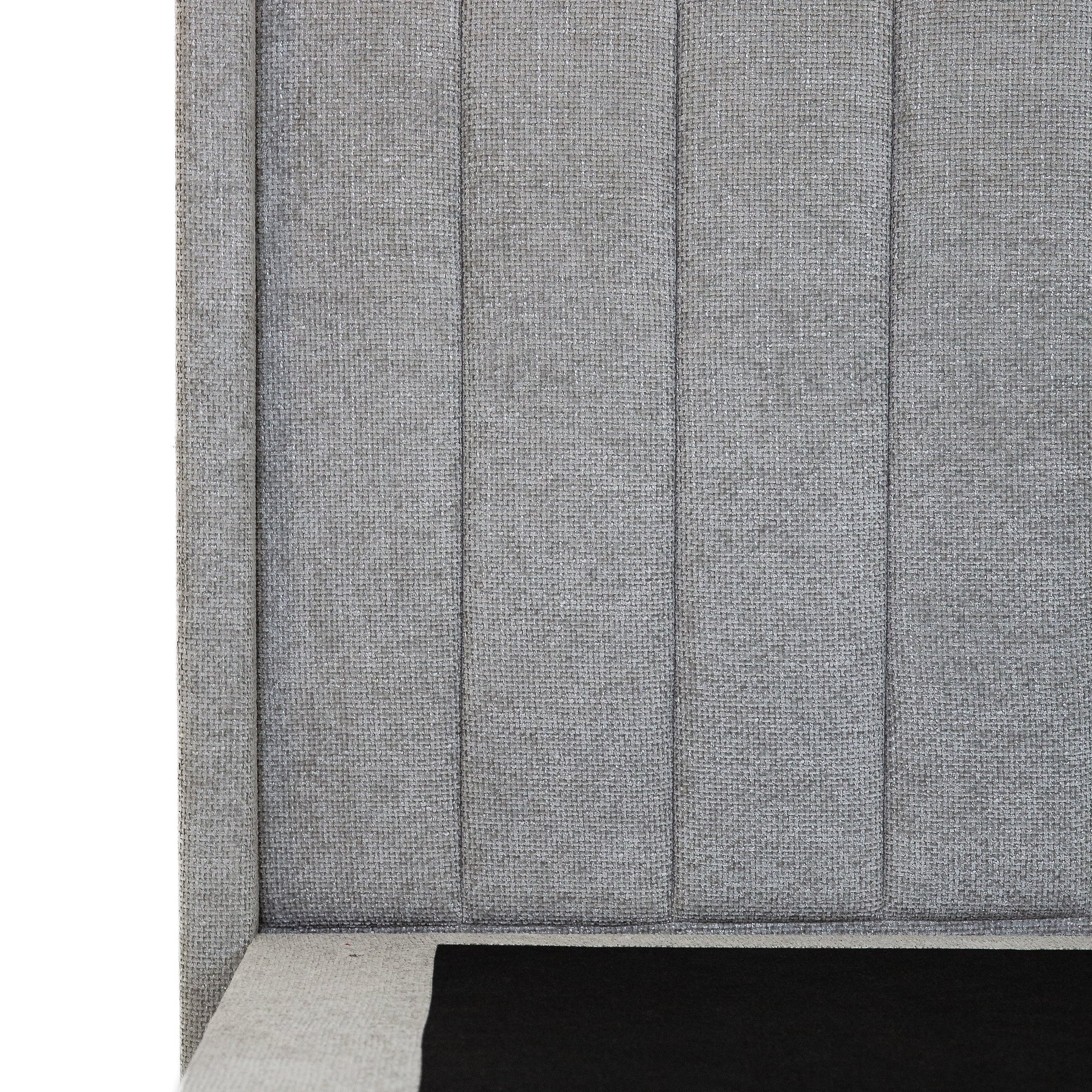 Front view of the Norell storage bed featuring a neutral woven fabric finish and a vertical channel tufted headboard