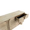 Close-up perspective of an open drawer highlighting the deep storage capacity and sleek internal wood finish