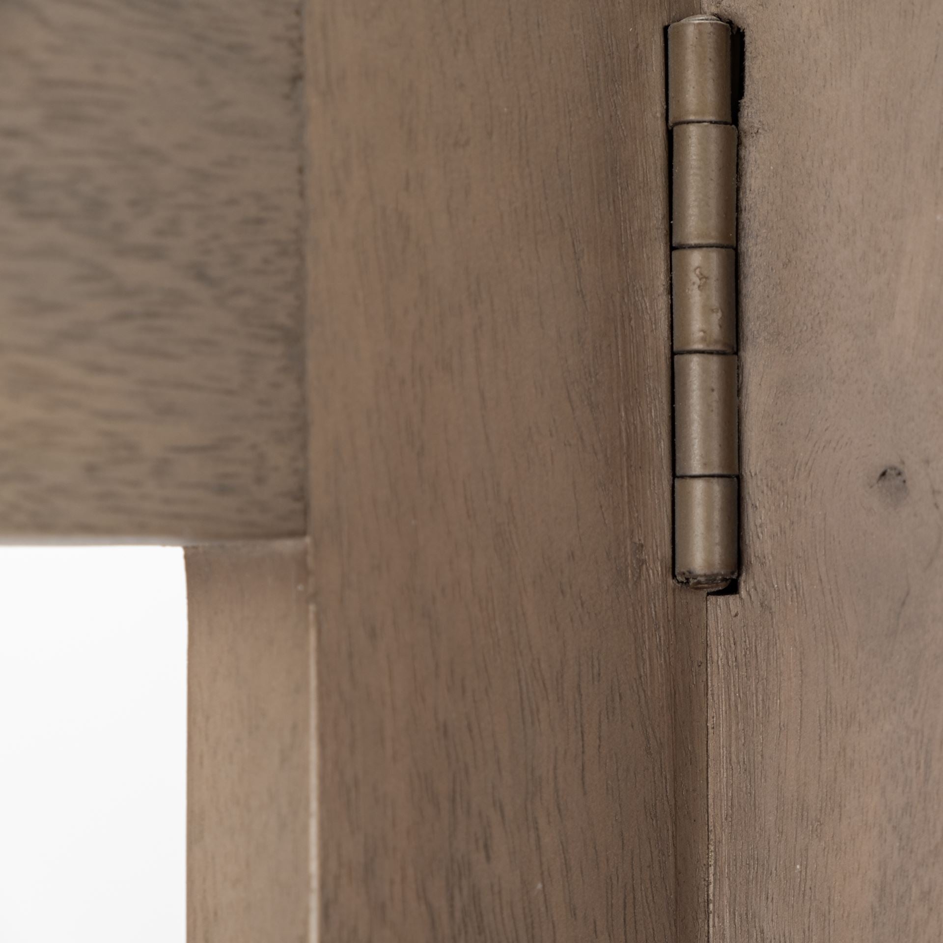 Straight-on front view of the Turnbull I shelving unit in light brown wood featuring a unique V-shaped open frame and four fixed shelves