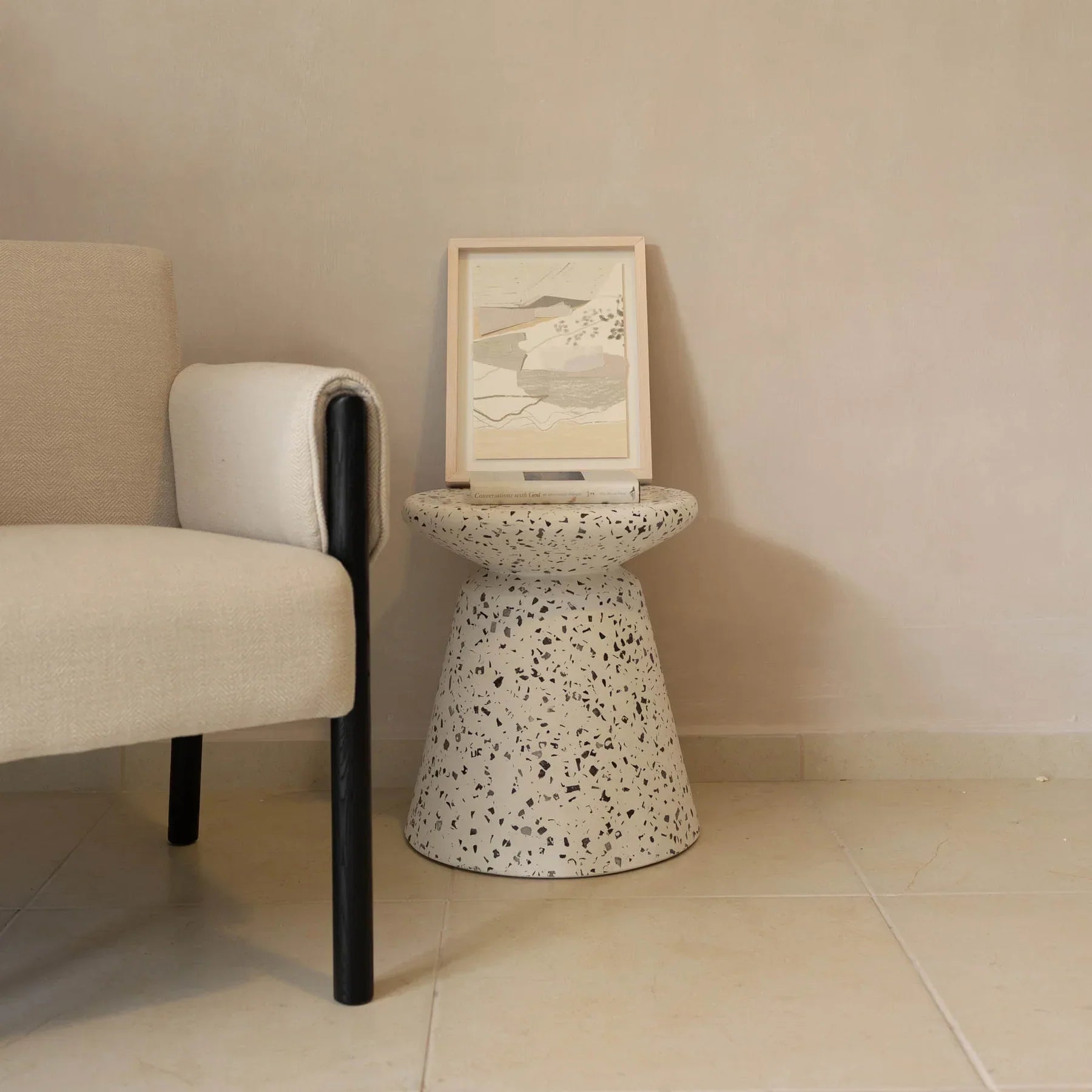 Forest club chair in ivory fabric styled in a modern living space