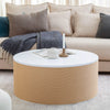 Lifestyle shot featuring the Fresco coffee table styled in a neutral living room with a beige sofa and grey accent pillows