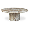 Front view of the Frida round outdoor coffee table featuring a thick brown marble top and a solid cylindrical pedestal base with natural mineral veining