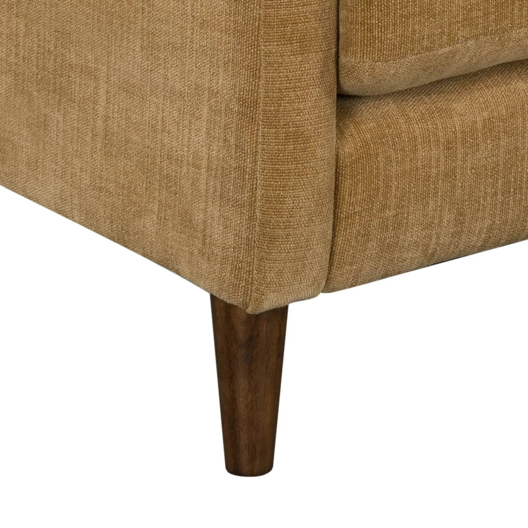 Detail view of the wood leg on the honey brown Gemma sofa