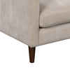 Detail of the sand beige upholstery and sofa corner