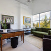 Gemma olive green sofa styled in a modern office interior