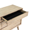 Top-down view into an open drawer showcasing the black felt-lined bottom and high-quality internal wood construction