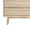 Macro detail shot focusing on the high-quality wood joinery and the elegant taper of the natural wood support legs