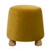 Front view of the Giselle round ottoman featuring rich dijon mustard velvet upholstery and four rustic tapered wood feet