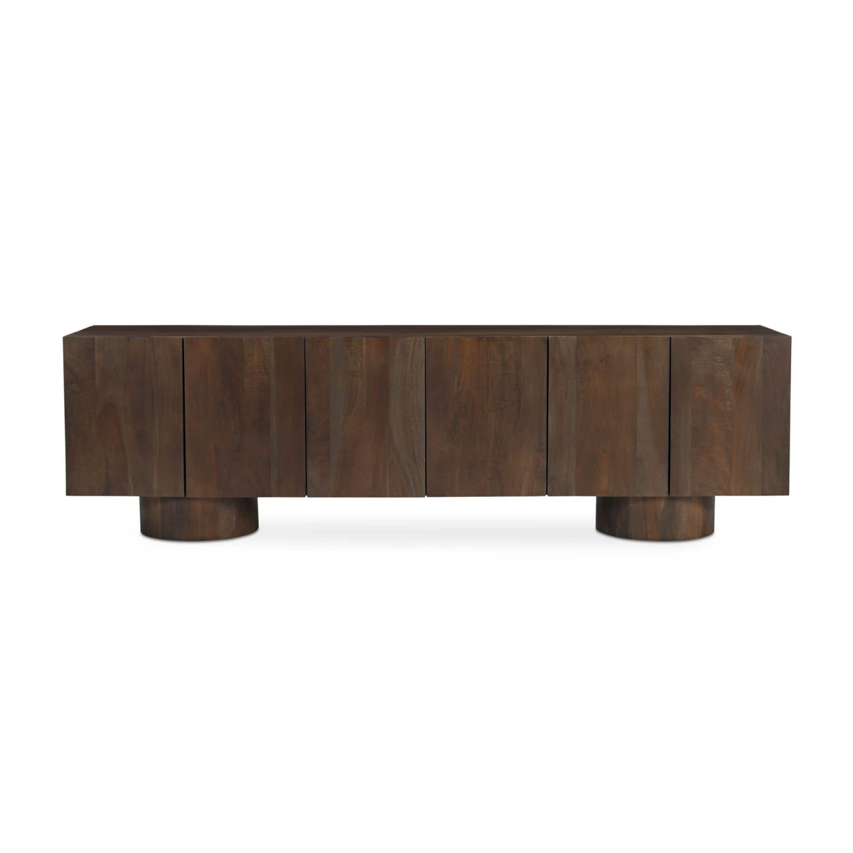 Front view of the Hadley media unit in warm brown solid wood featuring a seamless four-door design and architectural cylindrical plinth bases