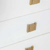 Macro detail shot focusing on the low-profile gold square handle against the smooth white finish