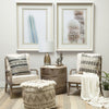 Lifestyle shot featuring a pair of Harman II chairs styled in a bright boho-chic living room with desert-inspired decor