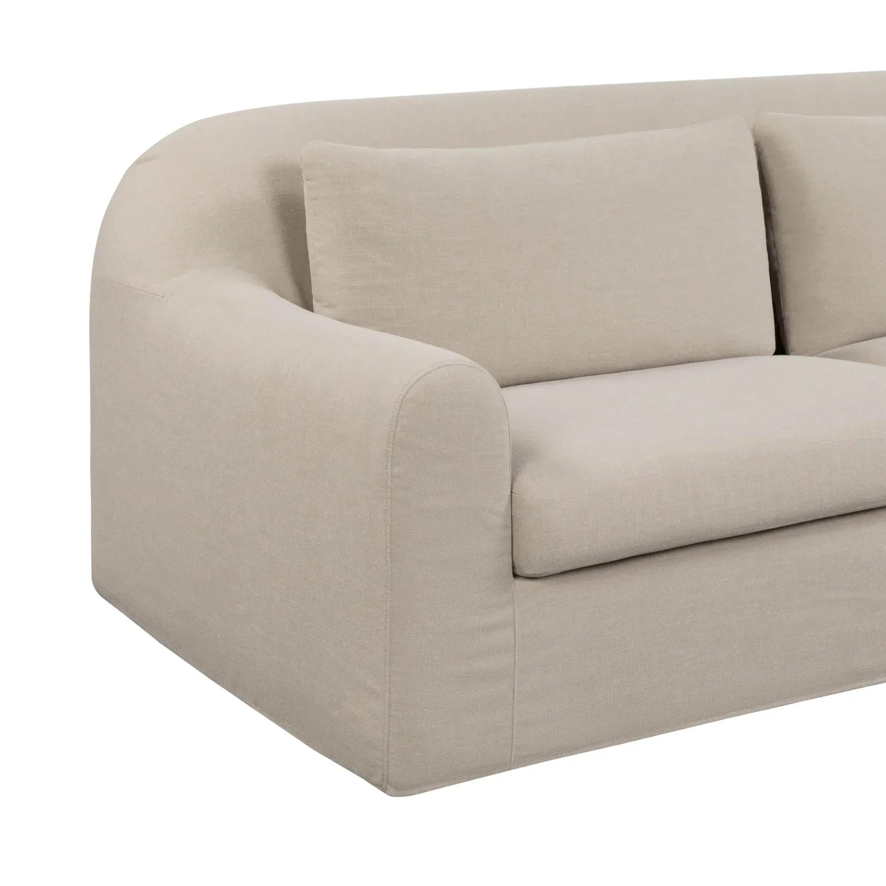 High-angle corner view of beige Harper slipcover sofa