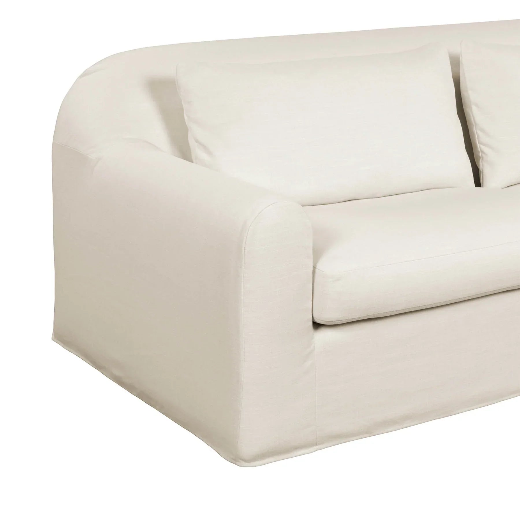 Perspective shot of cream Harper sofa armrest and base