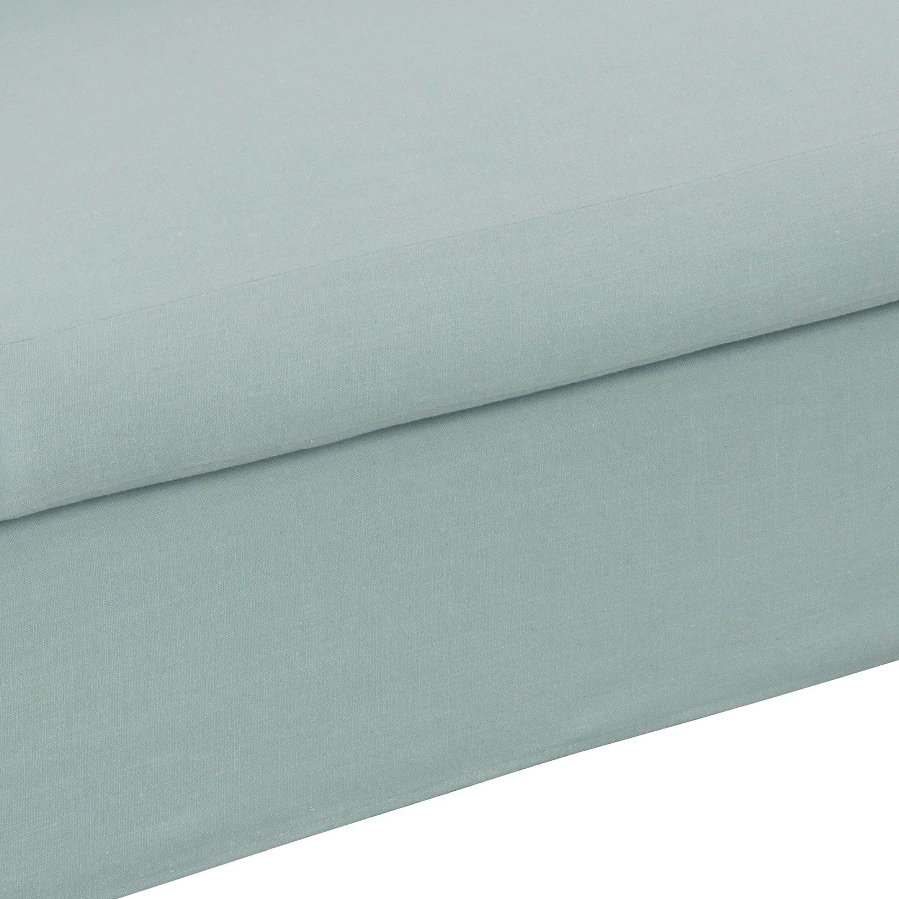 Detail shot of the slipcover hem on Harper sofa