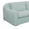 Close-up of curved arm and light blue fabric texture