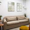Harper beige sofa styled in a modern office interior