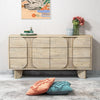 Studio lifestyle shot featuring the Haru dresser styled with modern decor accents and a minimalist vase