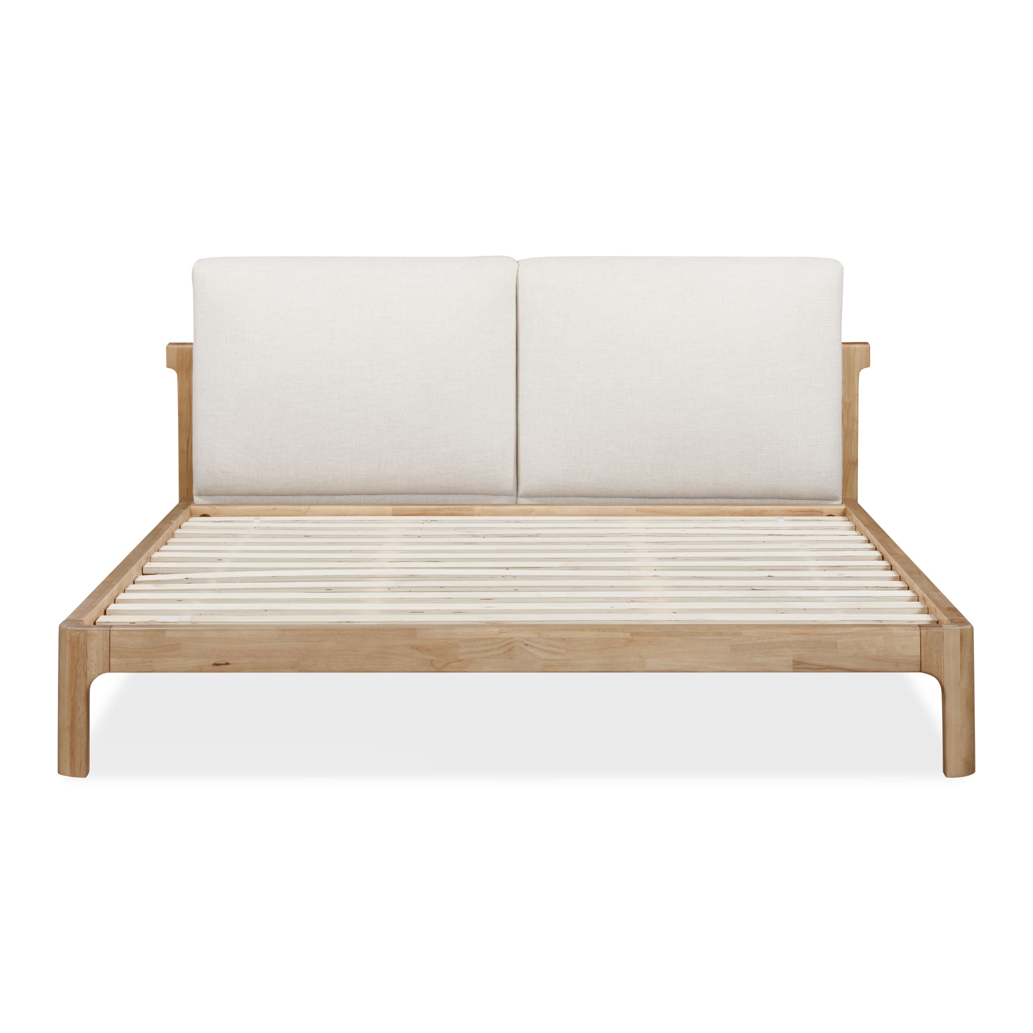 Front view of the Havn platform bed featuring a ginger-finished ash wood frame and a two-cushion natural linen headboard