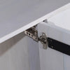 Macro shot focusing on the high-quality adjustable metal soft-close hinges and internal mounting hardware